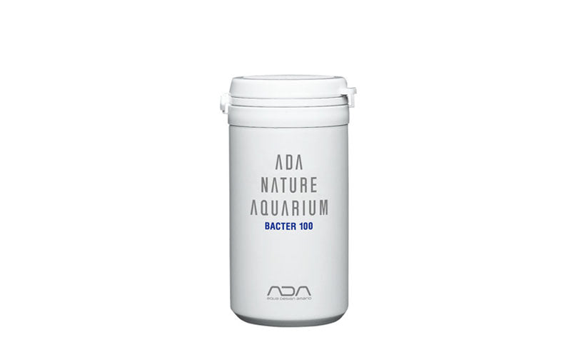 Weiße Kunststoffdose mit blauem Logo, beschriftet mit "ADA Nature Aquarium Bacter 100".